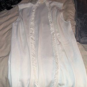 white sleeveless cardigan